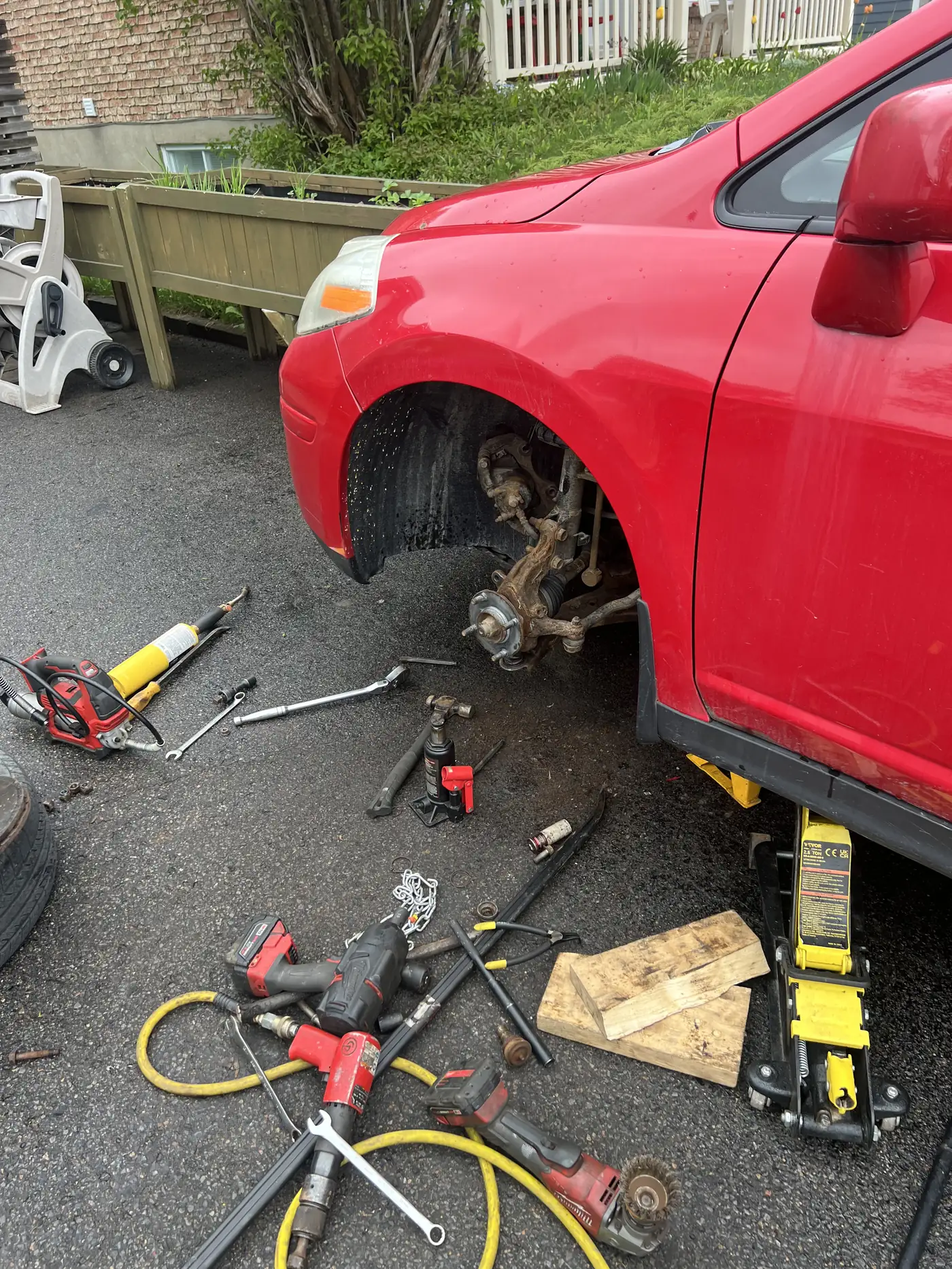 Voiture sur chandelles, réparation de freins et suspension à domicile